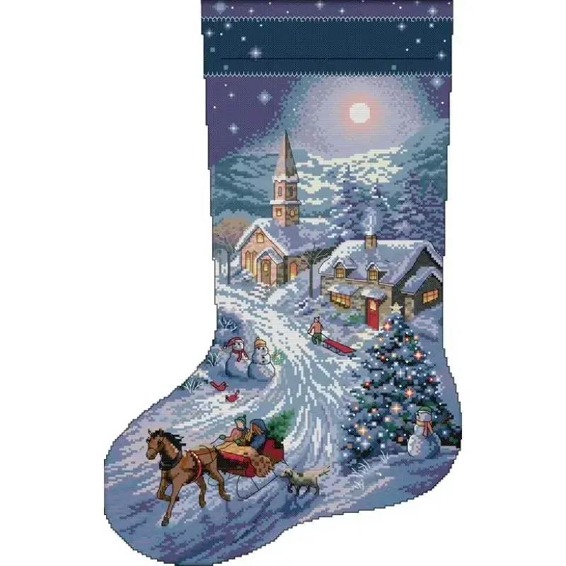 Christmas stocking cross stitch design C592: a moonlit village with a church, a horse-drawn sleigh and a lit tree in blue and violet tones