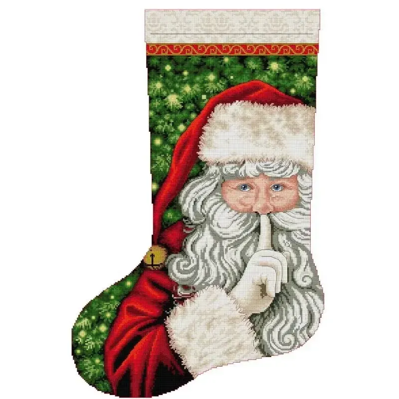 Hush Santa (KB174) Christmas stocking cross stitch design KB174: a portrait of Santa holding a finger to his lips beside glowing Christmas trees in red, green and linen tones