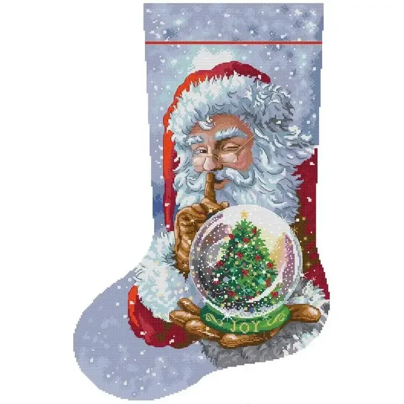 Christmas stocking cross stitch design KB176: a winking Santa holding a JOY snow globe with a Christmas tree inside, against a snowy sky
