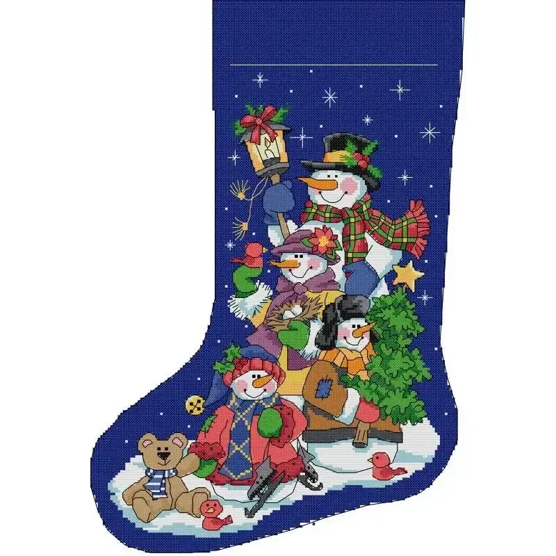 Christmas stocking cross stitch design KB179: a family of four snowmen with a lantern and ice skates, a bear cub and red birds on a starry royal-blue sky