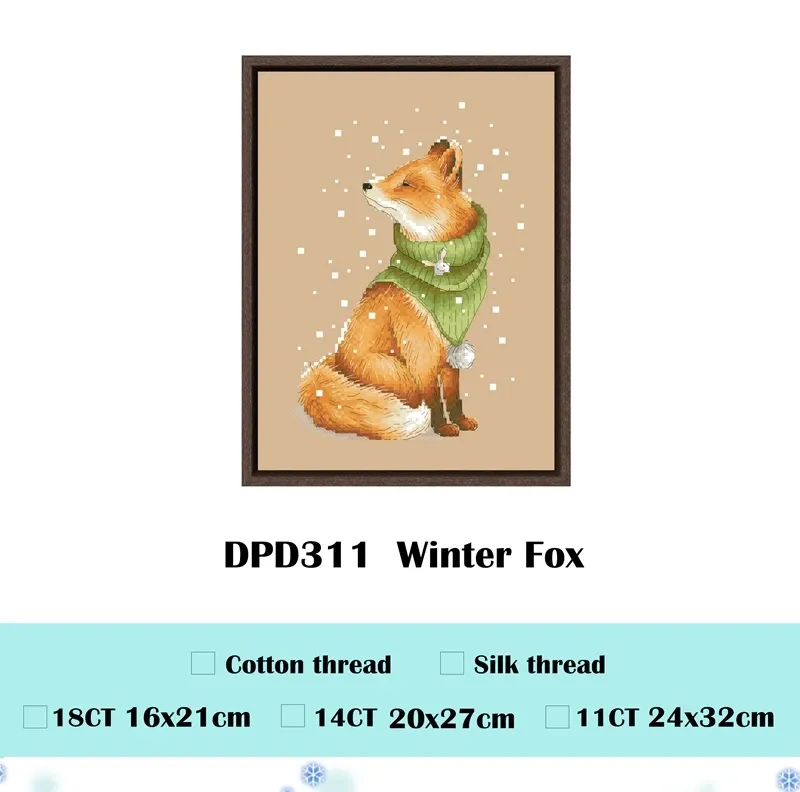 Winter Fox counted cross stitch design DPD311: a red fox sitting in profile in a green knit snood with a pompom, with falling snow on flaxen fabric