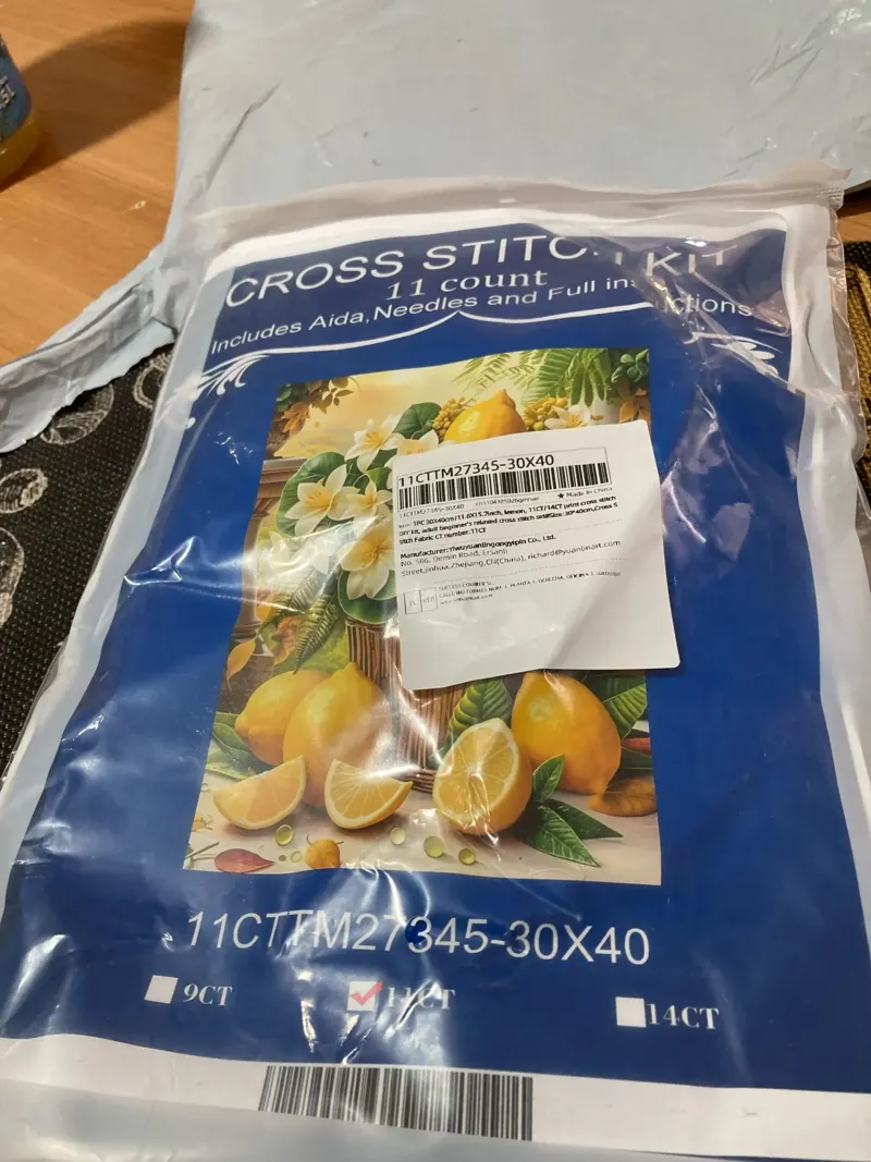 Buyer photo of the Lemons kit pouch in 11 count, with the lemon basket design and the TM27345 label