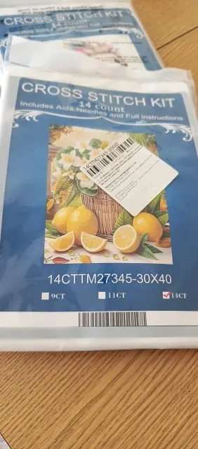 Buyer photo of several Lemons kit pouches in 14 count, stacked with the design visible on the front